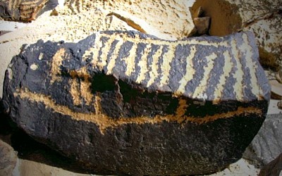 Negev Rock art that depicts the soul afterlife journey with a ship and a bird